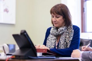 Rachel Reeves Chancellor of the Exchequer, sitting at a desk